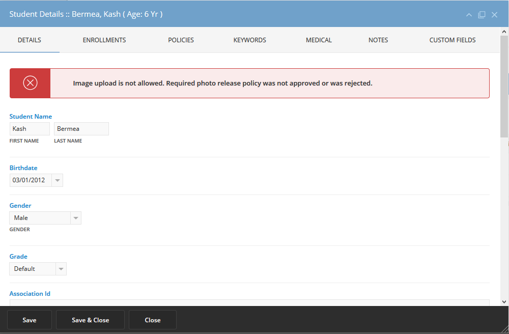 student_with_blocked_photo_waiver.png